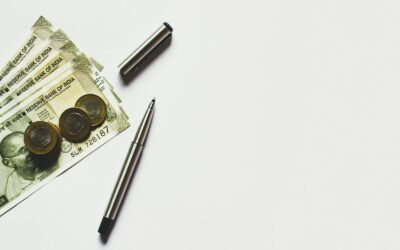 SBI PO 2026 Notification — Indian rupee banknotes with pen and coins